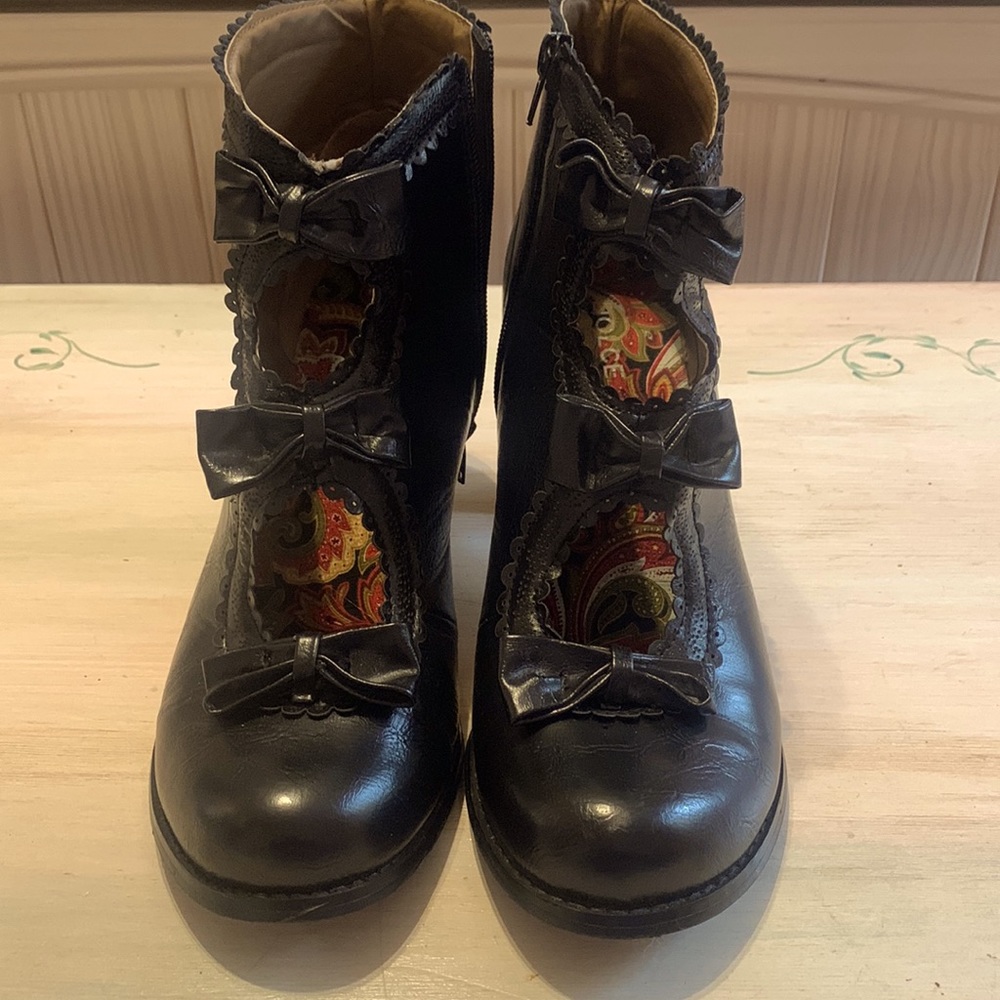 Black booties, 3” heel, size 9.5